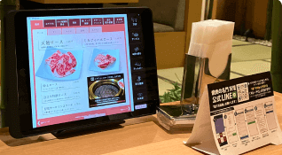 焼肉の名門 天壇様にセルフオーダーシステムを設置している内観